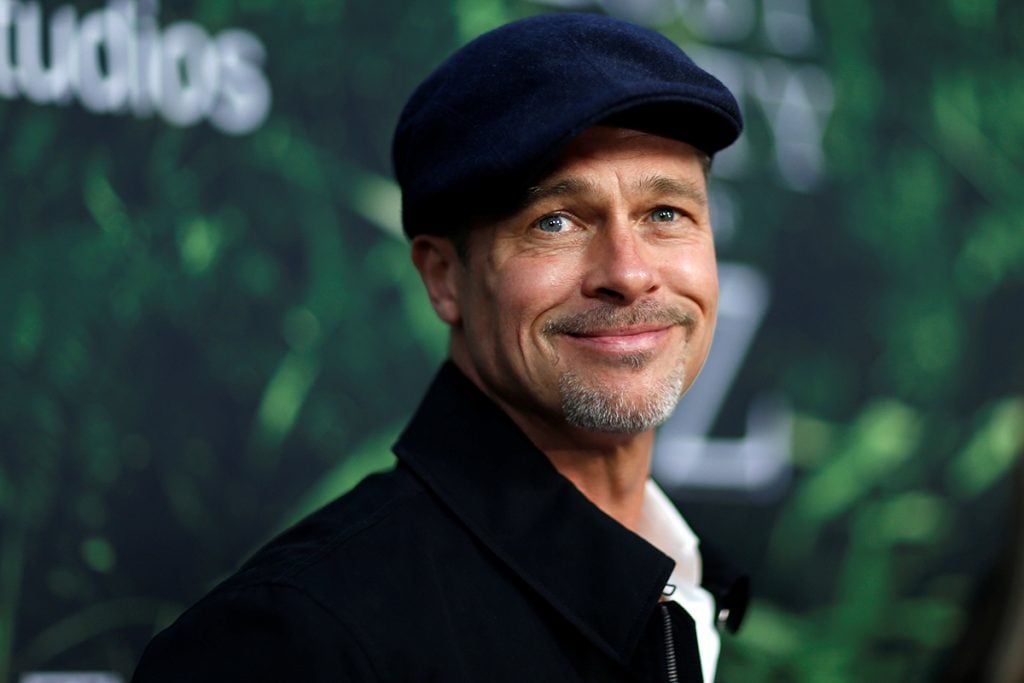 Producer Brad Pitt poses at the premiere of the movie