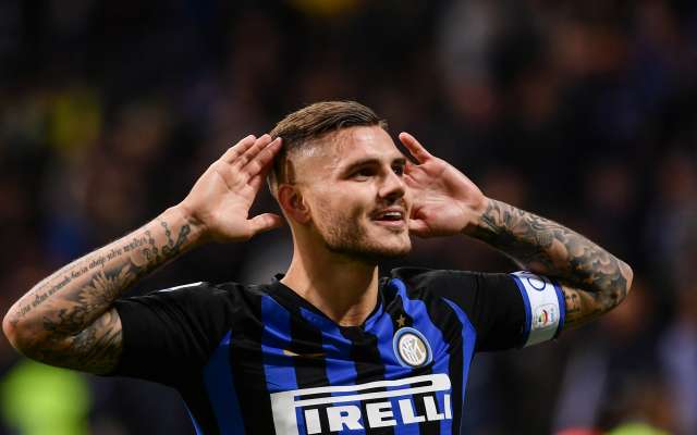 Inter Milan's Argentine forward Mauro Icardi celebrates after scoring during the Italian Serie A football match Inter Milan vs AC Milan on October 21, 2018 at the San Siro stadium in Milan. (Photo by Marco BERTORELLO / AFP)