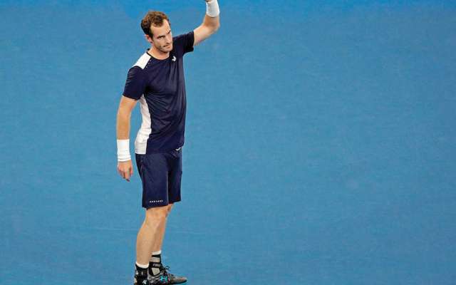 Britain's Andy Murray waves to the crowd after his first round loss to Spain's Roberto Bautista Agut at the Australian Open tennis championships in Melbourne, Australia, Monday, Jan. 14, 2019.(AP Photo/Mark Schiefelbein)