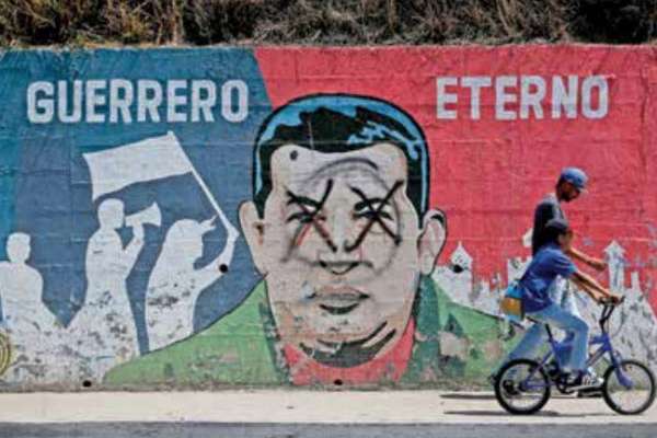 Los murales de Hugo Chávez que decoran paredes han
sido vandalizadas en diferentes partes del país.FOTO: AP