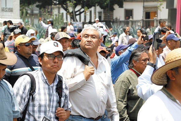 CASI. Enrique Enríquez (centro) confía en que
el miércoles sus demandas serán atendidas por el Presidente. Foto: Cuartoscuro